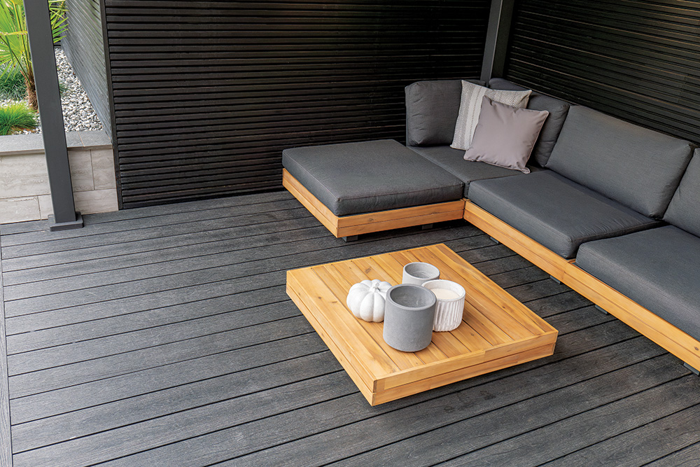 An image of a composite deck and comfy outdoor seating An image of a composite deck and comfy outdoor seating